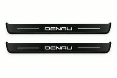 Catalogue illustration of two front black Matte PRO LED door sill plates with illuminated Denali lettering for GMC Canyon II; dimensions are selected during manufacture.