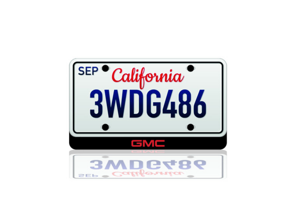 GMC LED badge below an illustrative U.S.-size license plate; plate not included