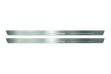 Two long silver-finished door sill plates with Hennessey lettering on a light background, straight-on view.