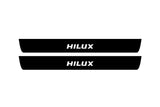 matte black coated stainless steel illuminated door sill protectors for Toyota Hilux VIII 2015+ with Hilux logo