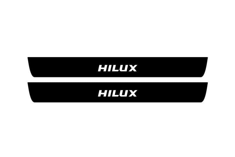 matte black coated stainless steel illuminated door sill protectors for Toyota Hilux VIII 2015+ with Hilux logo