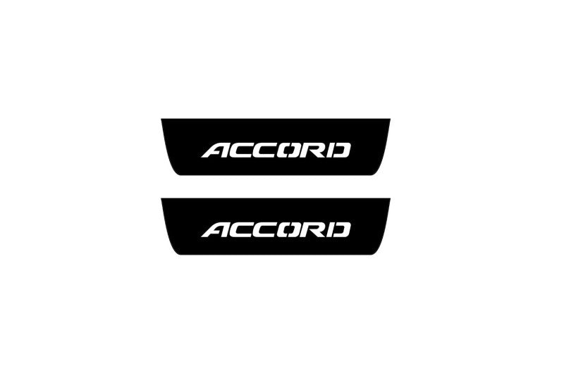 Catalog illustration of two black rear door sill plates with Accord lettering.