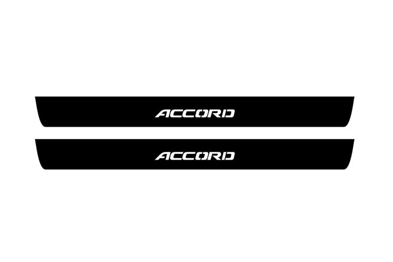 Catalog illustration of two black front door sill plates with Accord lettering.