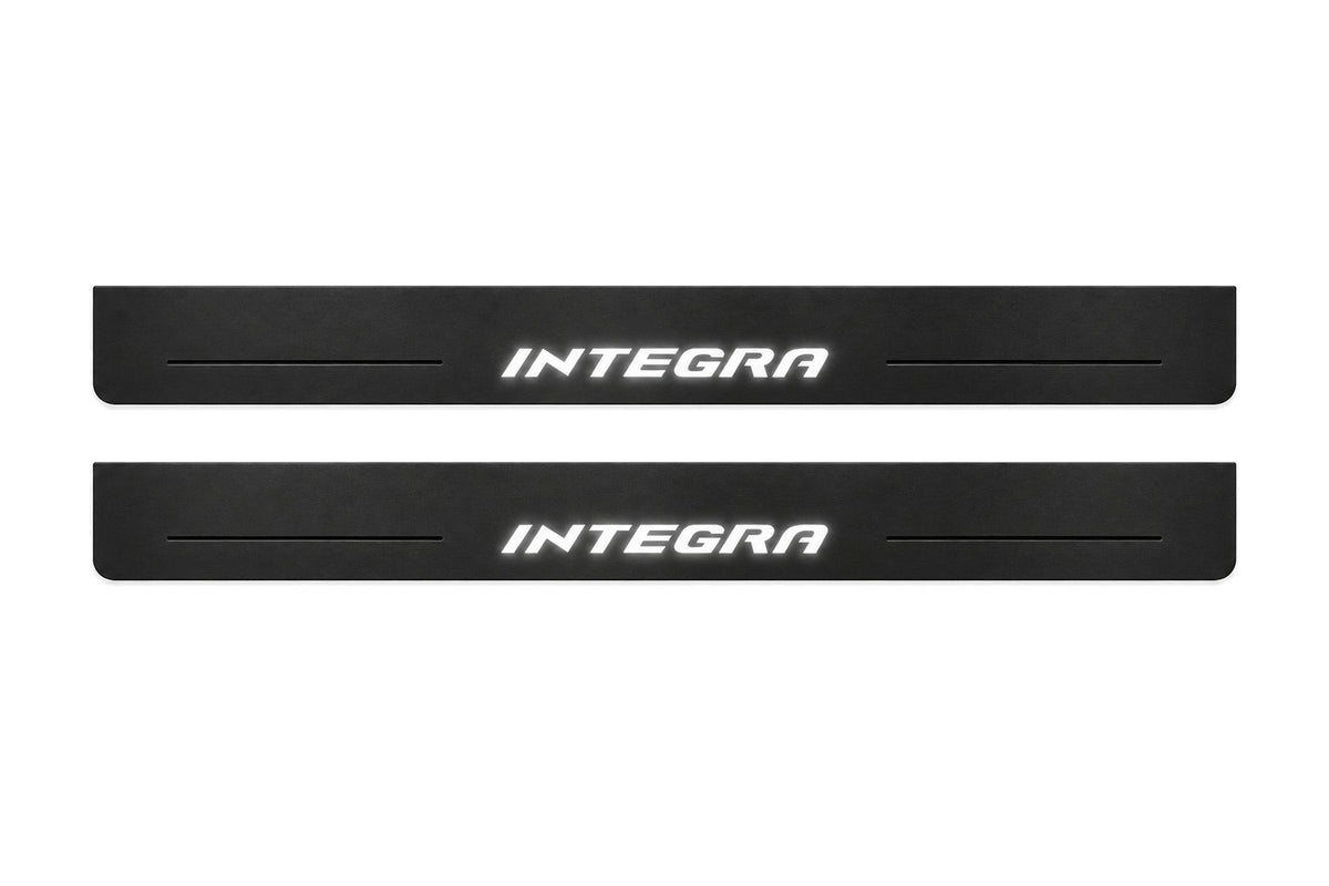 Catalogue illustration of two front black Matte PRO LED door sill plates with illuminated Integra lettering for Honda Integra; dimensions are selected during manufacture.