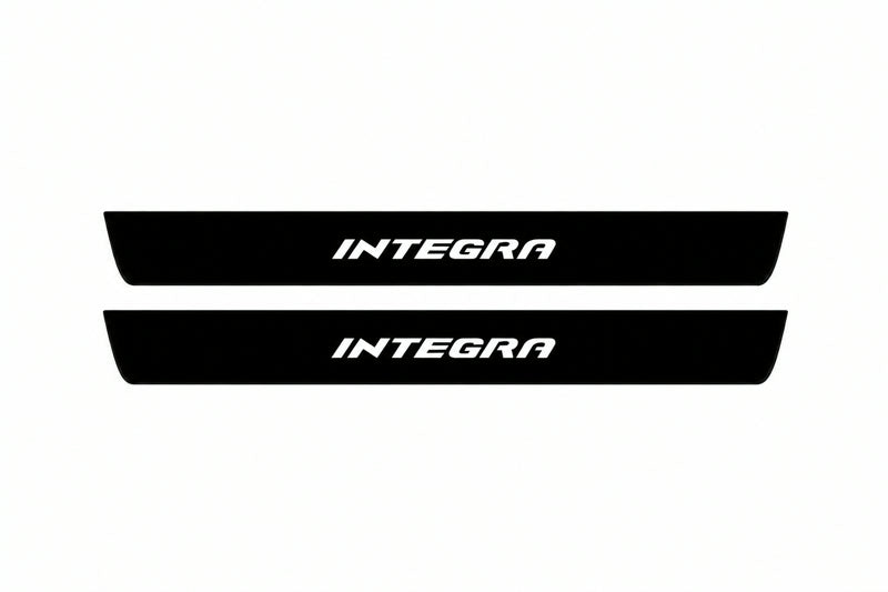 Catalogue illustration of two front black Matte PRO LED door sill plates with illuminated Integra lettering for Honda Integra; dimensions are selected during manufacture.