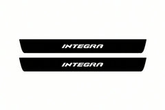 Catalogue illustration of two front black Matte PRO LED door sill plates with illuminated Integra lettering for Honda Integra; dimensions are selected during manufacture.