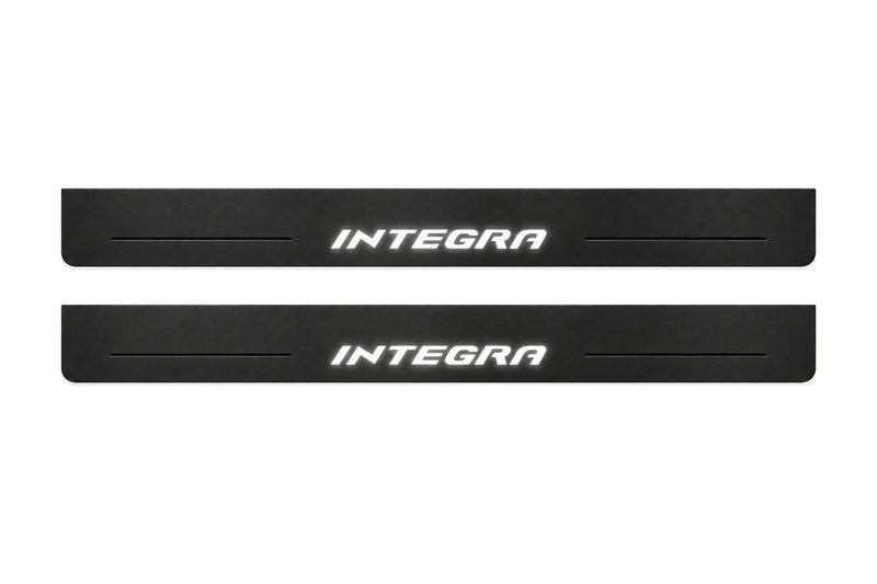 Catalogue illustration of two front black Matte PRO LED door sill plates with illuminated Integra lettering for Honda Integra; dimensions are selected during manufacture.