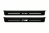 Catalogue illustration of two front black Matte PRO LED door sill plates with illuminated Jazz lettering for Honda Jazz; dimensions are selected during manufacture.