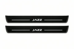 Catalogue illustration of two front black Matte PRO LED door sill plates with illuminated Jazz lettering for Honda Jazz; dimensions are selected during manufacture.