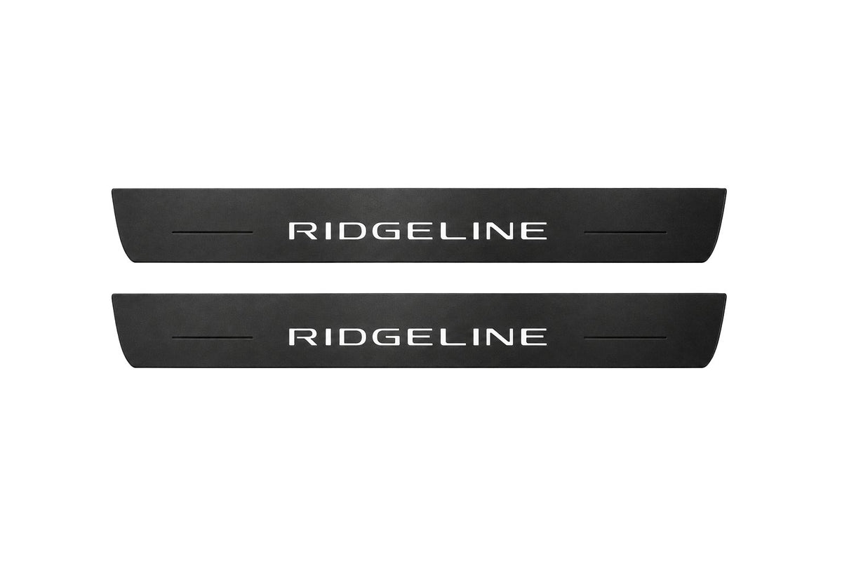 Catalogue illustration of two front black Matte PRO LED door sill plates with illuminated Ridgeline lettering for Honda Ridgeline YK2; dimensions are selected during manufacture.