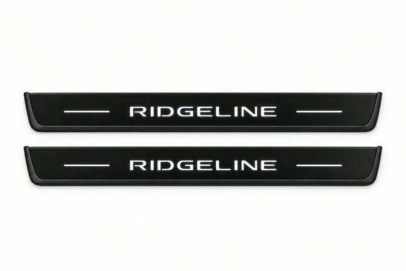 Catalogue illustration of two front black Matte PRO LED door sill plates with illuminated Ridgeline lettering for Honda Ridgeline YK2; dimensions are selected during manufacture.