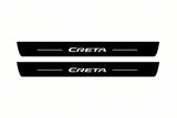 Catalogue illustration of two front black Matte PRO LED door sill plates with illuminated Creta lettering for Hyundai Creta I; dimensions are selected during manufacture.