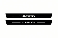 Catalogue illustration of two front black Matte PRO LED door sill plates with illuminated Creta lettering for Hyundai Creta I; dimensions are selected during manufacture.