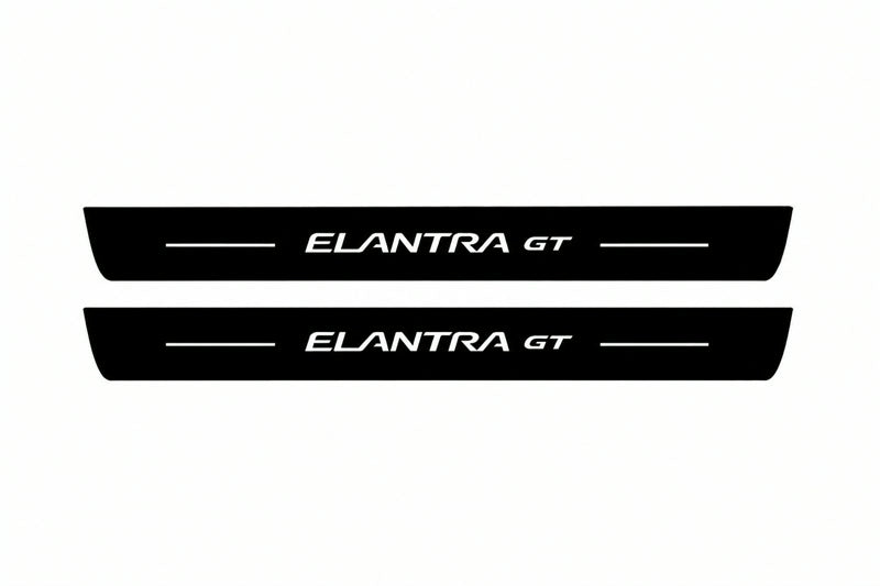 Catalogue illustration of two front black Matte PRO LED door sill plates with illuminated Elantra GT lettering for Hyundai Elantra GT; dimensions are selected during manufacture.