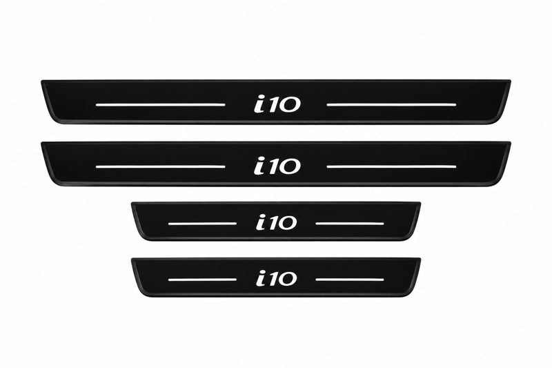 Catalog illustration of two front and two rear black Matte PRO LED door sill plates with illuminated i10 lettering for Hyundai i10 IA.