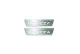 Two short silver-finished door sill plates with Impreza lettering on a light background, straight-on view.