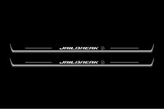 Two long door sill plates with Jailbreak with a Hellcat head emblem lettering and edges illuminated in white, straight-on view on a dark background.