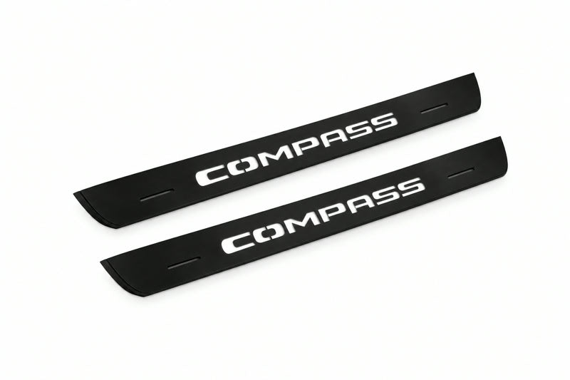 Catalogue illustration of two front black Matte PRO LED door sill plates with illuminated Compass lettering for Jeep Compass MP; dimensions are selected during manufacture.