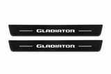 Catalogue illustration of two front black Matte PRO LED door sill plates with illuminated Gladiator lettering for Jeep Gladiator JT; dimensions are selected during manufacture.