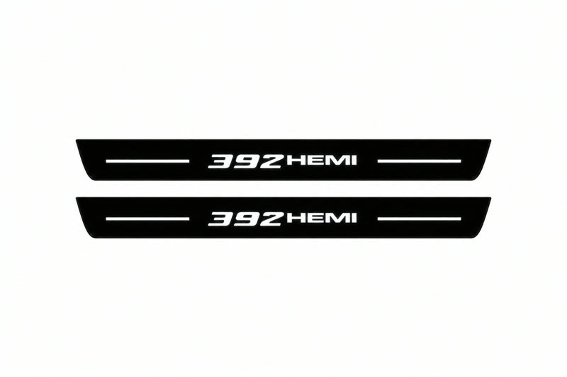 Catalogue illustration of two front black Matte PRO LED door sill plates with illuminated 392 HEMI lettering for Jeep Grand Cherokee WK2; dimensions are selected during manufacture.