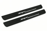 Catalogue illustration of two front black Matte PRO LED door sill plates with illuminated SRT Supercharged lettering for Jeep Grand Cherokee WK2; dimensions are selected during manufacture.