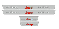Catalog illustration of four gray door sill plates with red Jeep lettering and mountain graphics on the long pair.