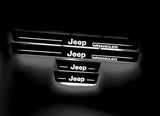 Jeep Wrangler JK 2006+ illuminated entry guards in stainless steel with Jeep Wrangler logo