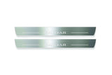Two long silver-finished door sill plates with Kadjar lettering on a light background, straight-on view.