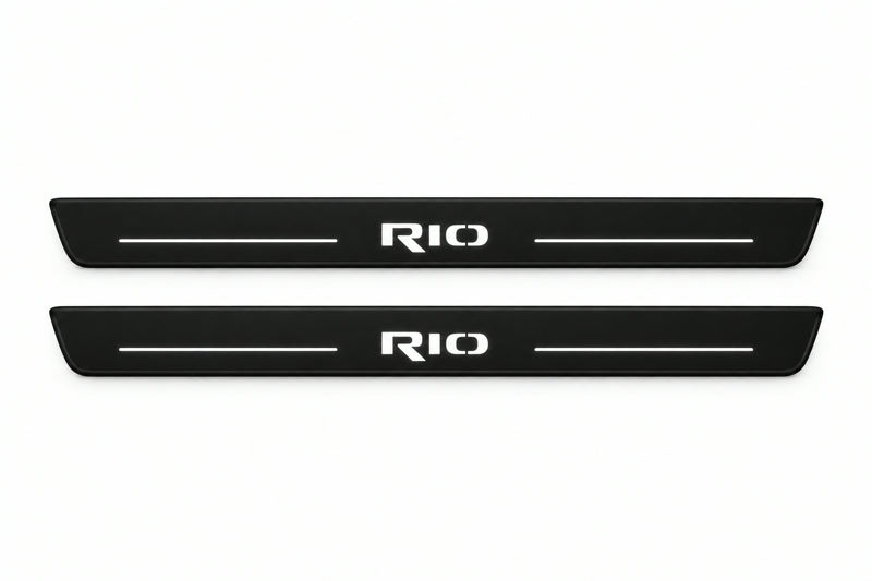Catalogue illustration of two front black Matte PRO LED door sill plates with illuminated Rio lettering for Kia Rio III; dimensions are selected during manufacture.