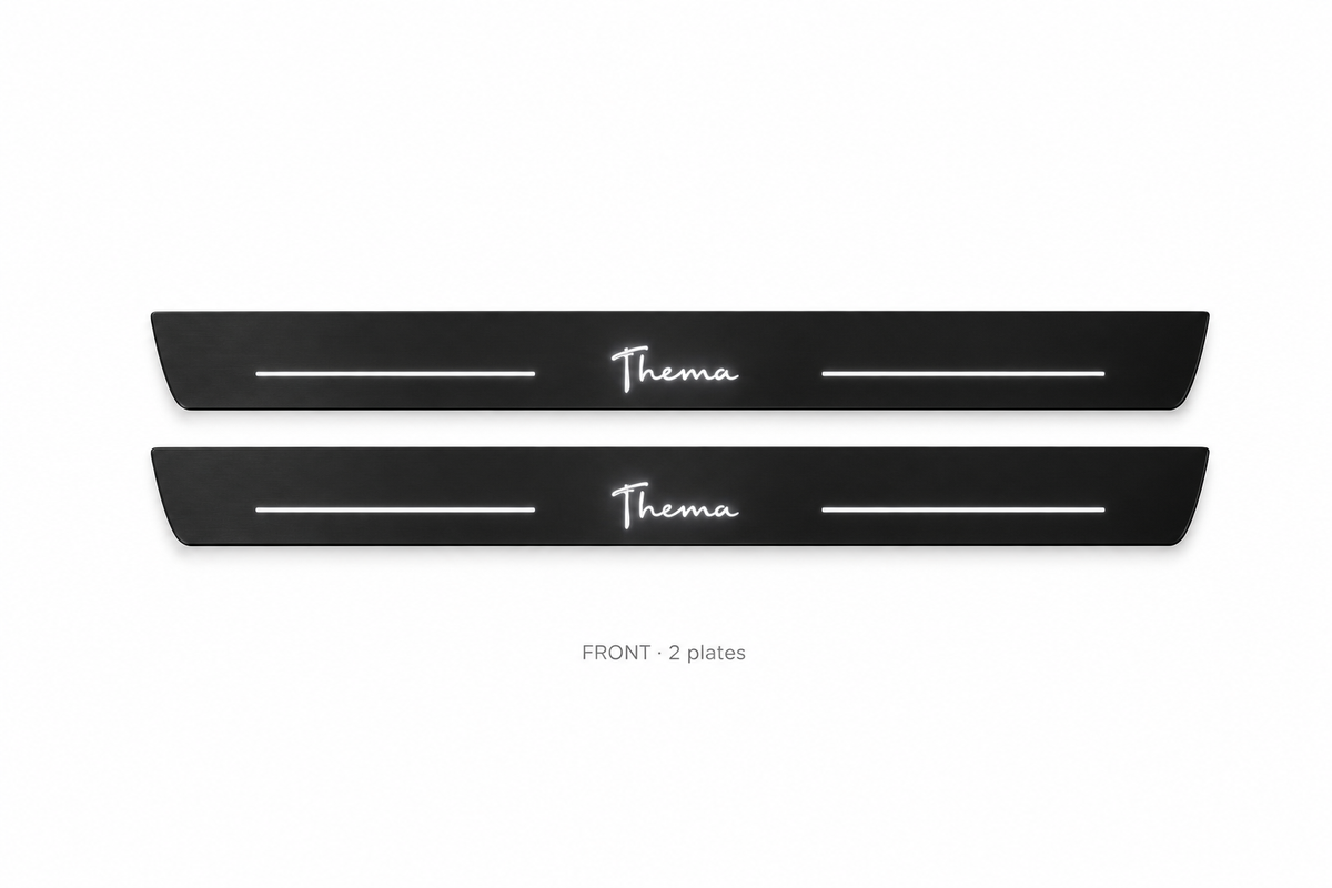 Lancia Thema Matte PRO catalogue illustration: two flat black FRONT plates with illuminated cursive Thema lettering on white