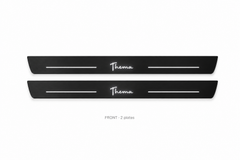 Lancia Thema Matte PRO catalogue illustration: two flat black FRONT plates with illuminated cursive Thema lettering on white
