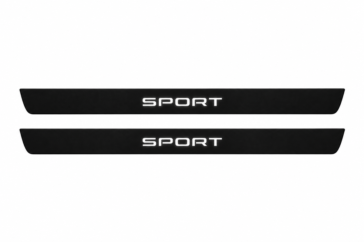 Catalogue illustration of two black Matte PRO front door sill plates with white SPORT lettering illuminated only on top. Edges are unlit; rear plates for FRONT+REAR are not pictured. Final dimensions are selected for Discovery Sport L550 during manufacture.