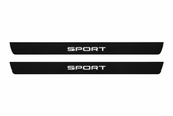 Catalogue illustration of two black Matte PRO front door sill plates with white SPORT lettering illuminated only on top. Edges are unlit; rear plates for FRONT+REAR are not pictured. Final dimensions are selected for Discovery Sport L550 during manufacture.