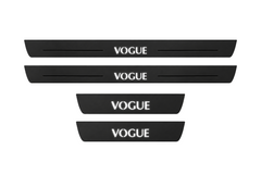 Catalog illustration of two front and two rear black Matte PRO door sill plates with serif VOGUE lettering and flanking lines illuminated on top; opaque unlit side edges. Final dimensions selected for Range Rover L322.
