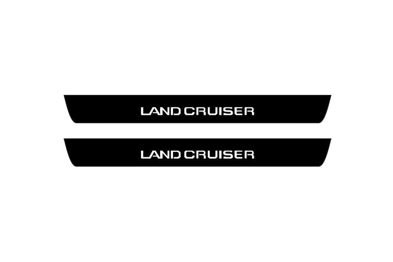 matte black coated stainless steel illuminated door sill protectors with Toyota Prado 250 2023+ with Land Cruiser logo