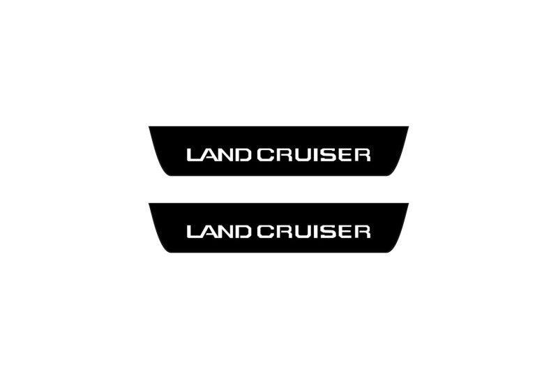 Toyota Prado 250 2023+ entry guards in matte black coated stainless steel with Land Cruiser logo