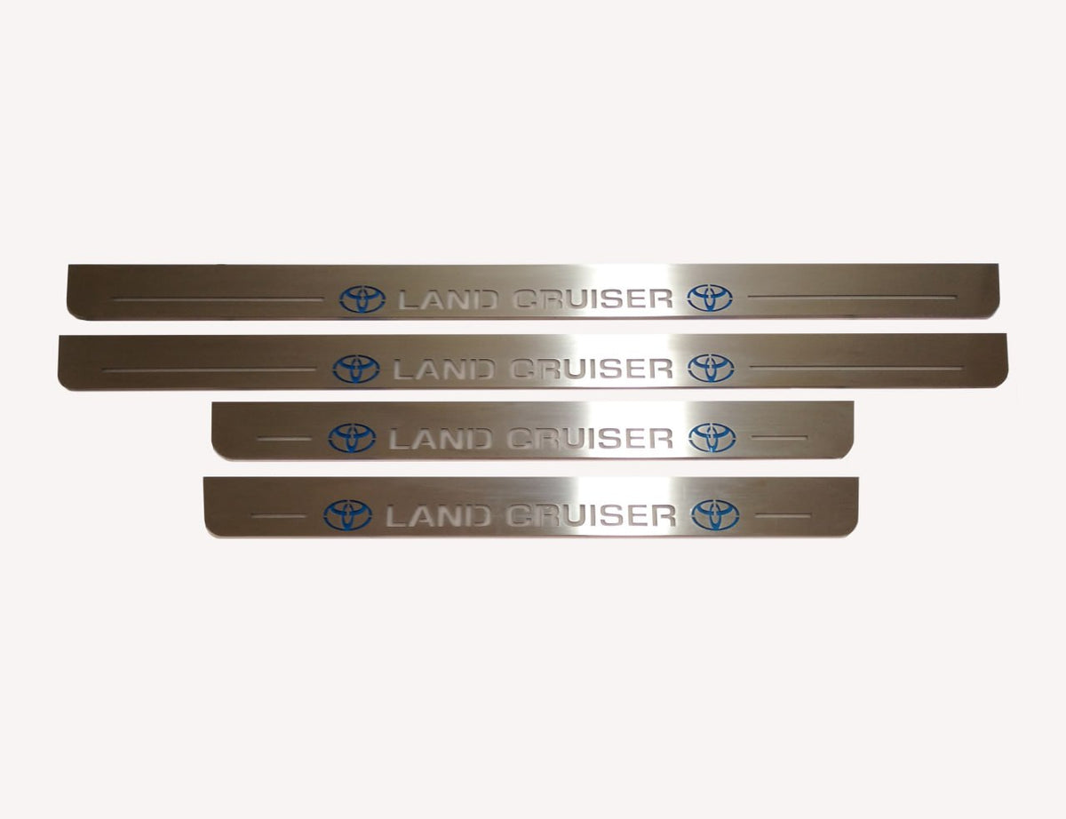 Toyota LC 200 2007+ door sill plates in stainless steel with Land Cruiser logo