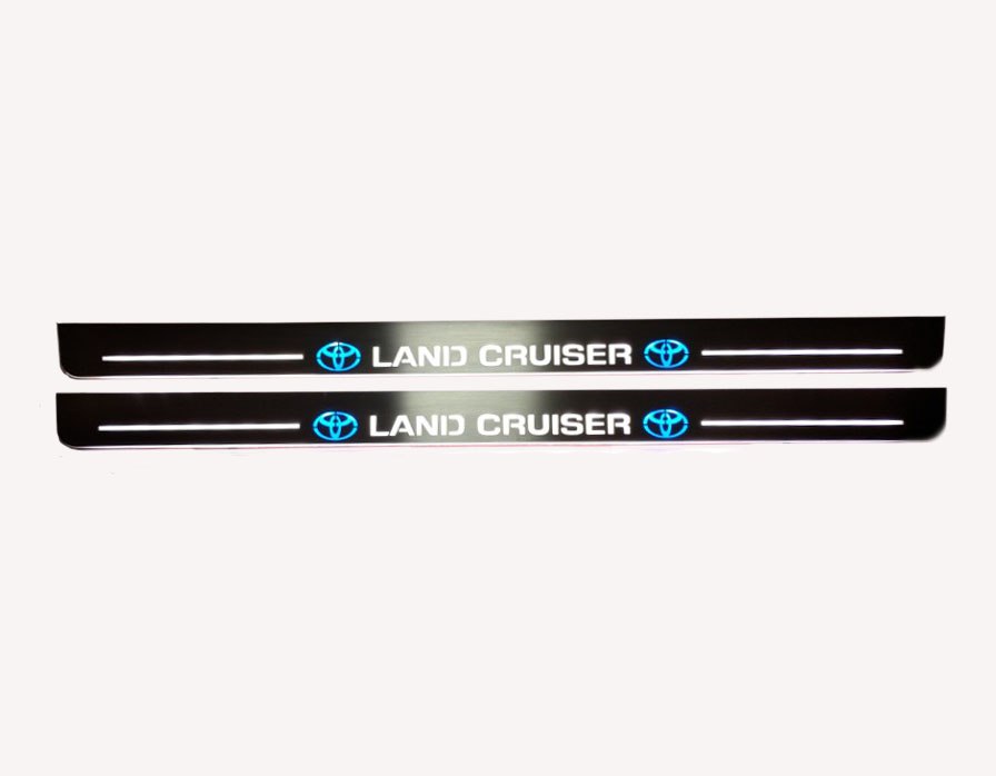 Toyota LC 200 2007+ stainless steel illuminated entry guards with Land Cruiser logo