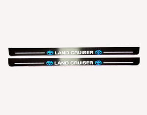 Toyota LC 200 2007+ stainless steel illuminated entry guards with Land Cruiser logo