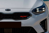 Kia KIA GT LED grille badge installed on a grille