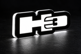 Hummer H3 LED grille badge with lighting at night
