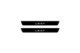 Nissan Leaf I 2010+ entry guards in matte black coated stainless steel with Leaf logo