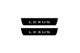 Catalog illustration of two black rear door sill plates with Lexus lettering.
