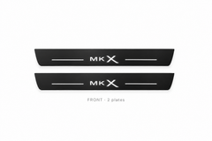 Lincoln MKX II Matte PRO catalogue illustration: two flat black FRONT plates with illuminated MKX lettering on white