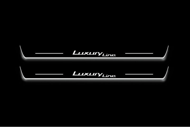 BMW X5 G05 2019+ door sill plates in stainless steel with Luxury Line logo