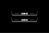 BMW 5 E34 1987+ entry guards in stainless steel with M5 logo