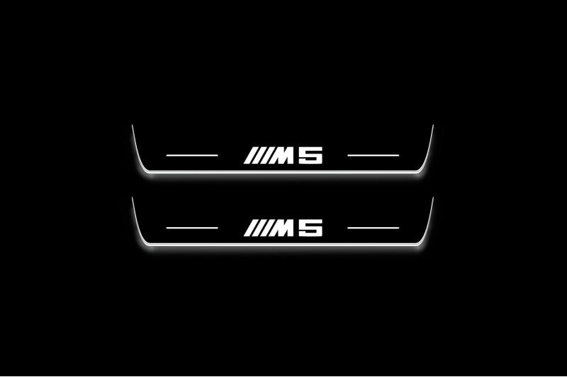 BMW 5 E34 1987+ entry guards in stainless steel with M5 logo