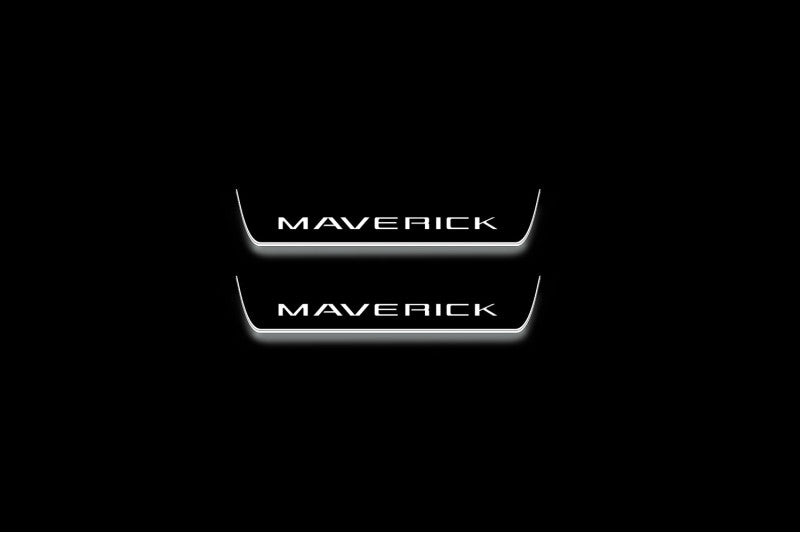 Two short door sill plates with Maverick lettering and edges illuminated in white, straight-on view on a dark background.