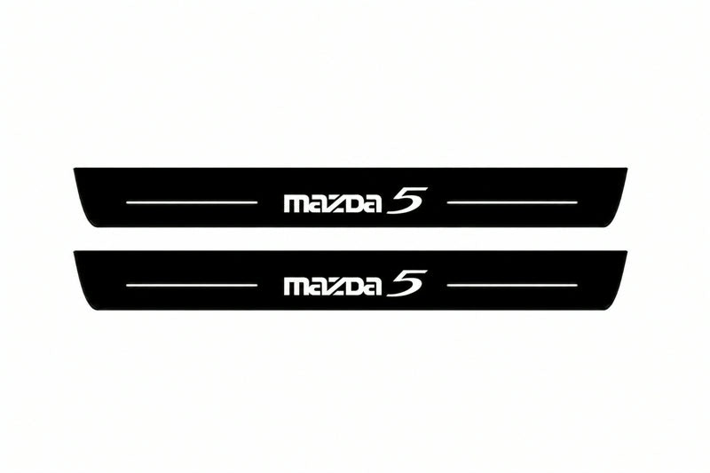 Catalogue illustration of two front black Matte PRO LED door sill plates with illuminated Mazda 5 lettering for Mazda 5 I; dimensions are selected during manufacture.