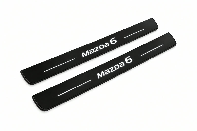 Catalogue illustration of two front black Matte PRO LED door sill plates with illuminated Mazda 6 lettering for Mazda 6 Sedan GJ/GL; dimensions are selected during manufacture.